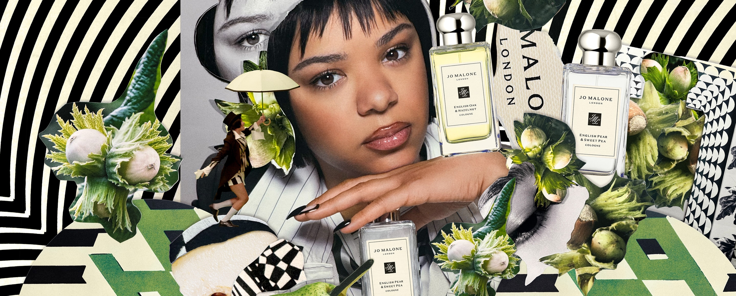 A person in a top hat sprays themselves with perfume, surrounded by a Jo Malone London display with black and white print.