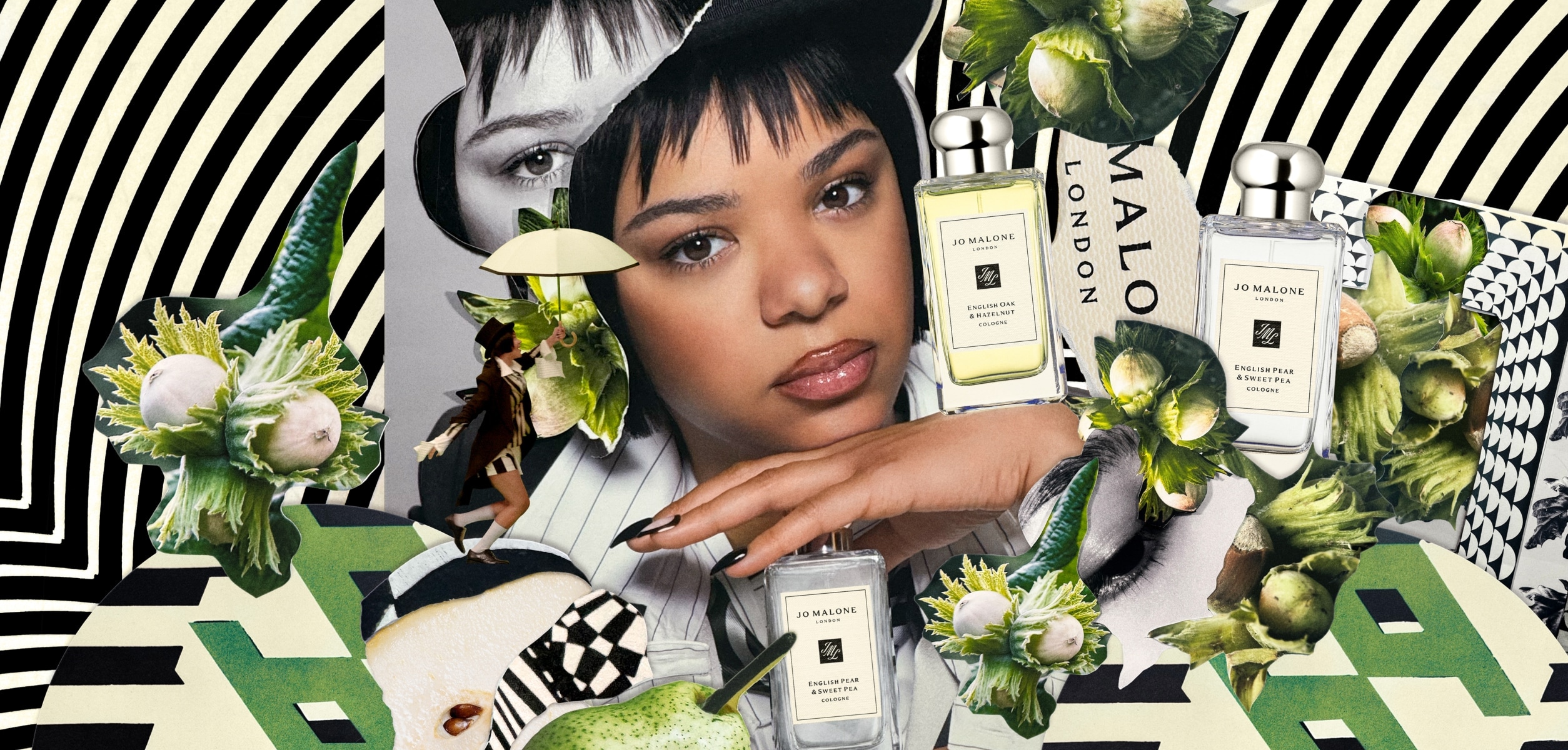 A person in a top hat sprays themselves with perfume, surrounded by a Jo Malone London display with black and white print.